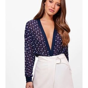 Plunging long sleeve body suite